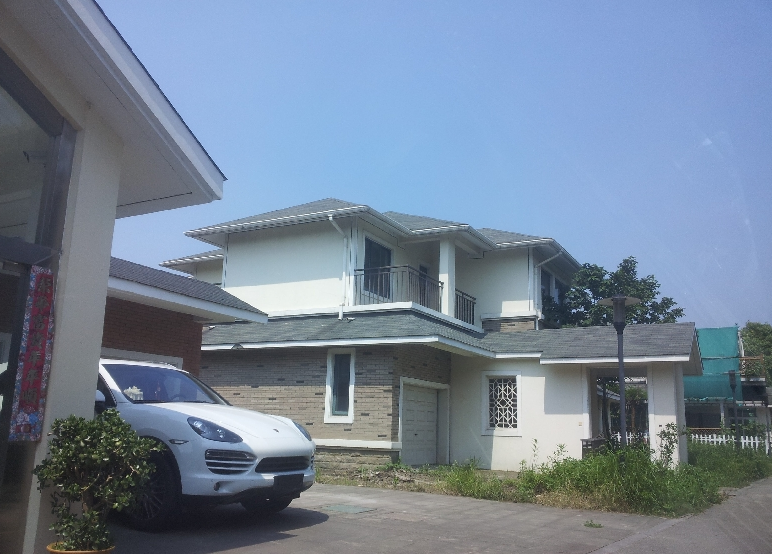 抗風卷簾門走（zǒu）進昆山（shān）森林別（bié）墅